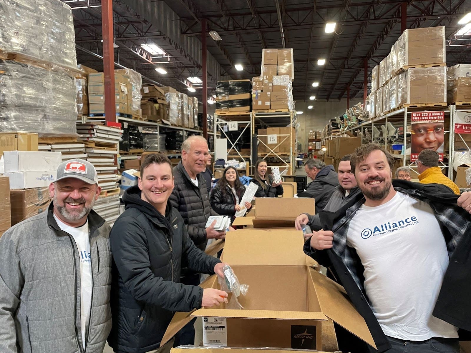 An image of people packing boxes with medical supplies